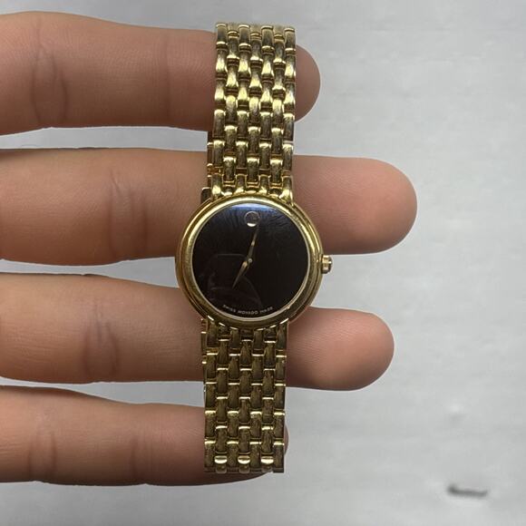 Movado Ladies Watch Gold Tone with Black Dial 28mm Case Excellent!